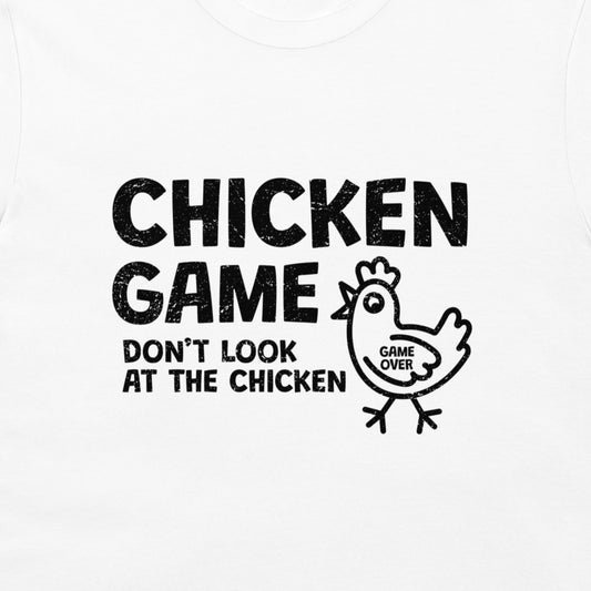 White t-shirt with a black distressed graphic print that reads 'CHICKEN GAME DON'T LOOK AT THE CHICKEN' alongside a cartoon chicken with 'GAME OVER' written on its chest.