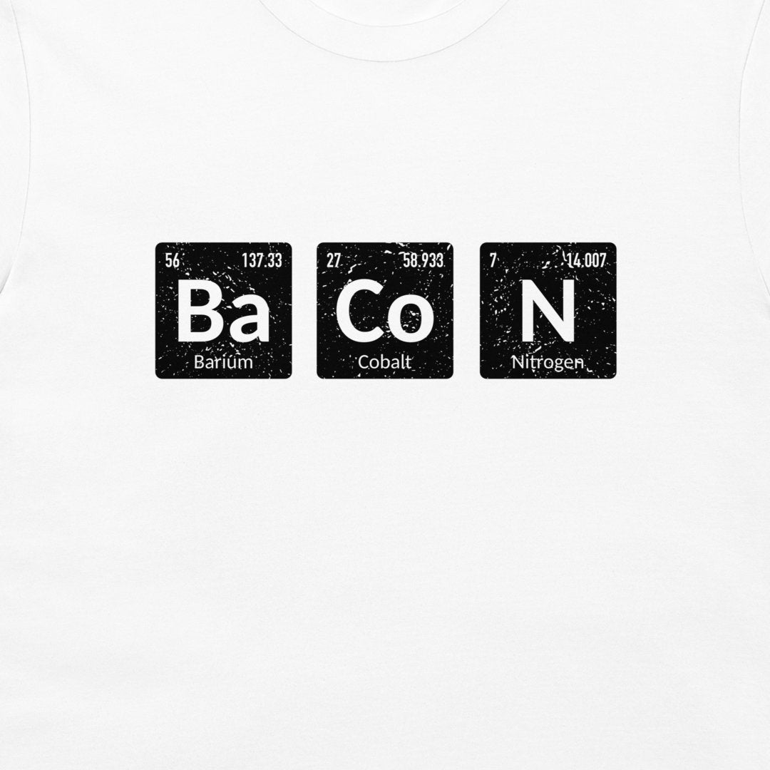 A white crewneck t-shirt featuring a graphic print of three black periodic table style tiles spelling out 'BaCoN' with white text.