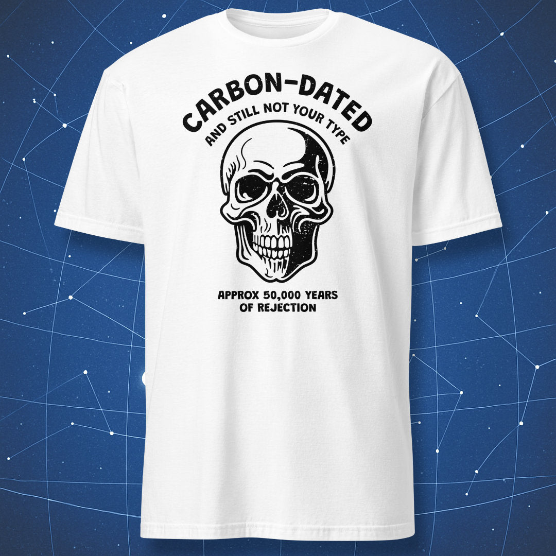 geek humor T-shirt on white fabric featuring black skull drawing and caption “Carbon-dated and still not your type”