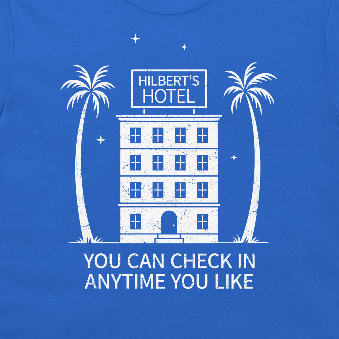 A blue t-shirt featuring a white graphic print of a building labeled 'HILBERT'S HOTEL' with two palm trees and the text 'YOU CAN CHECK IN ANYTIME YOU LIKE'.