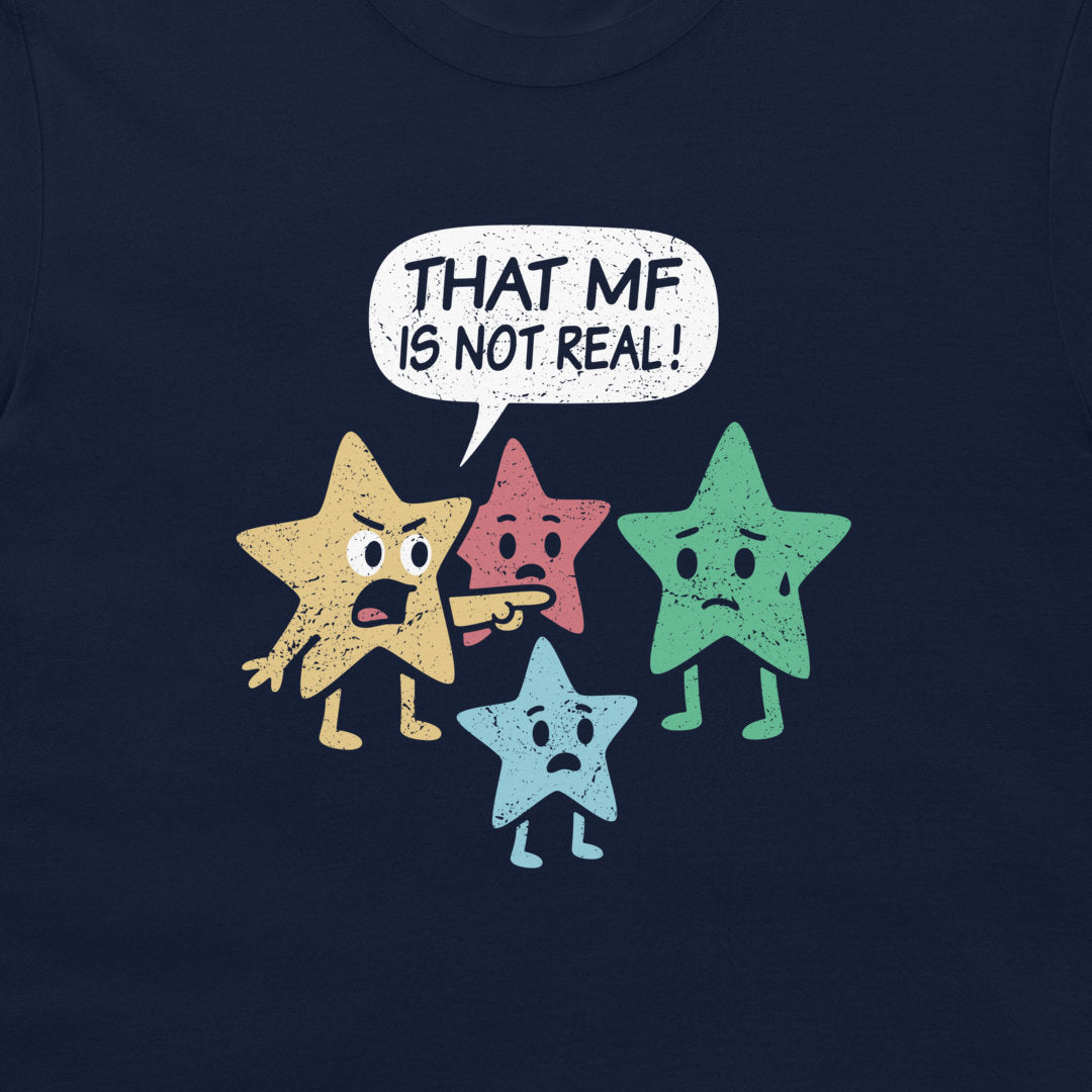 A close-up of a navy blue t-shirt featuring a distressed graphic of four cartoon stars in yellow, pink, green, and light blue pointing at each other, with a white speech bubble above that reads 'THAT MF IS NOT REAL!'.