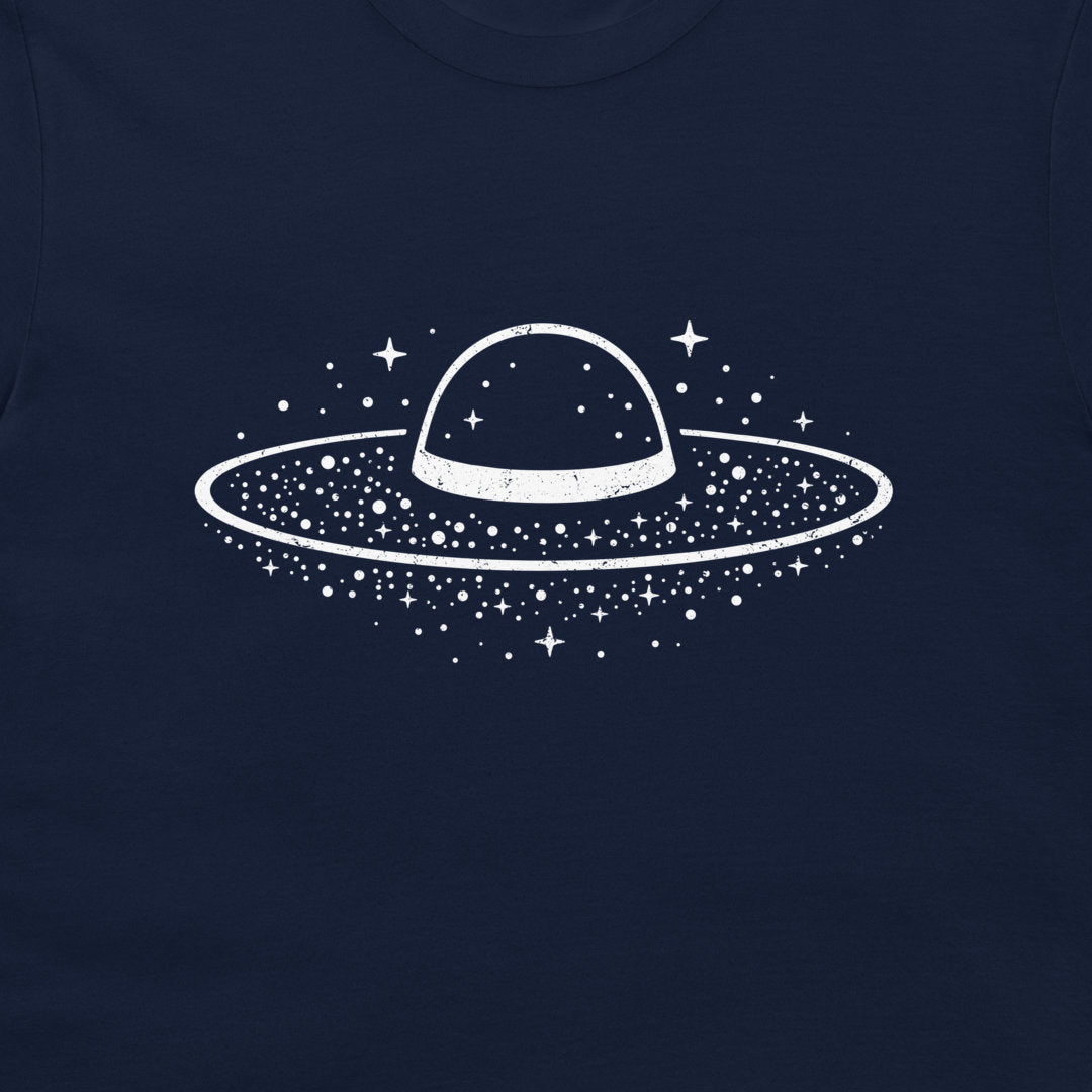 A close-up of a white space-aesthetic Sombrero Galaxy graphic on navy astronomy shirt