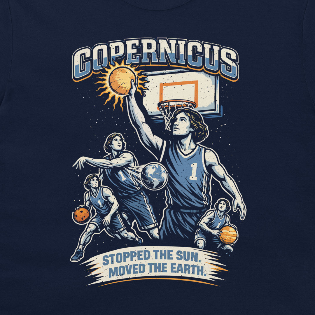 A navy blue graphic t-shirt featuring a stylized illustration of basketball players around a basketball hoop, with the text 'COPERNICUS' and 'STOPPED THE SUN. MOVED THE EARTH.