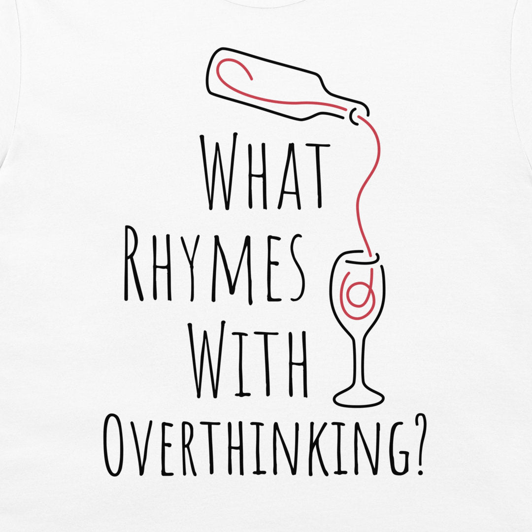 A white graphic t-shirt featuring a humorous design with the text 'WHAT RHYMES WITH OVERTHINKING?' in black hand-lettered font. A simple line drawing of a wine bottle pouring red liquid into a wine glass is positioned above the text.