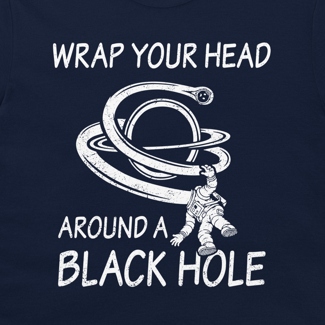 A black graphic print featuring a white distressed design with the text 'WRAP YOUR HEAD AROUND A BLACK HOLE' and an illustration of an astronaut falling into a ringed black hole.