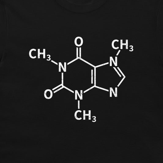 A close-up of a caffeine molecule structure graphic printed on a black T-shirt