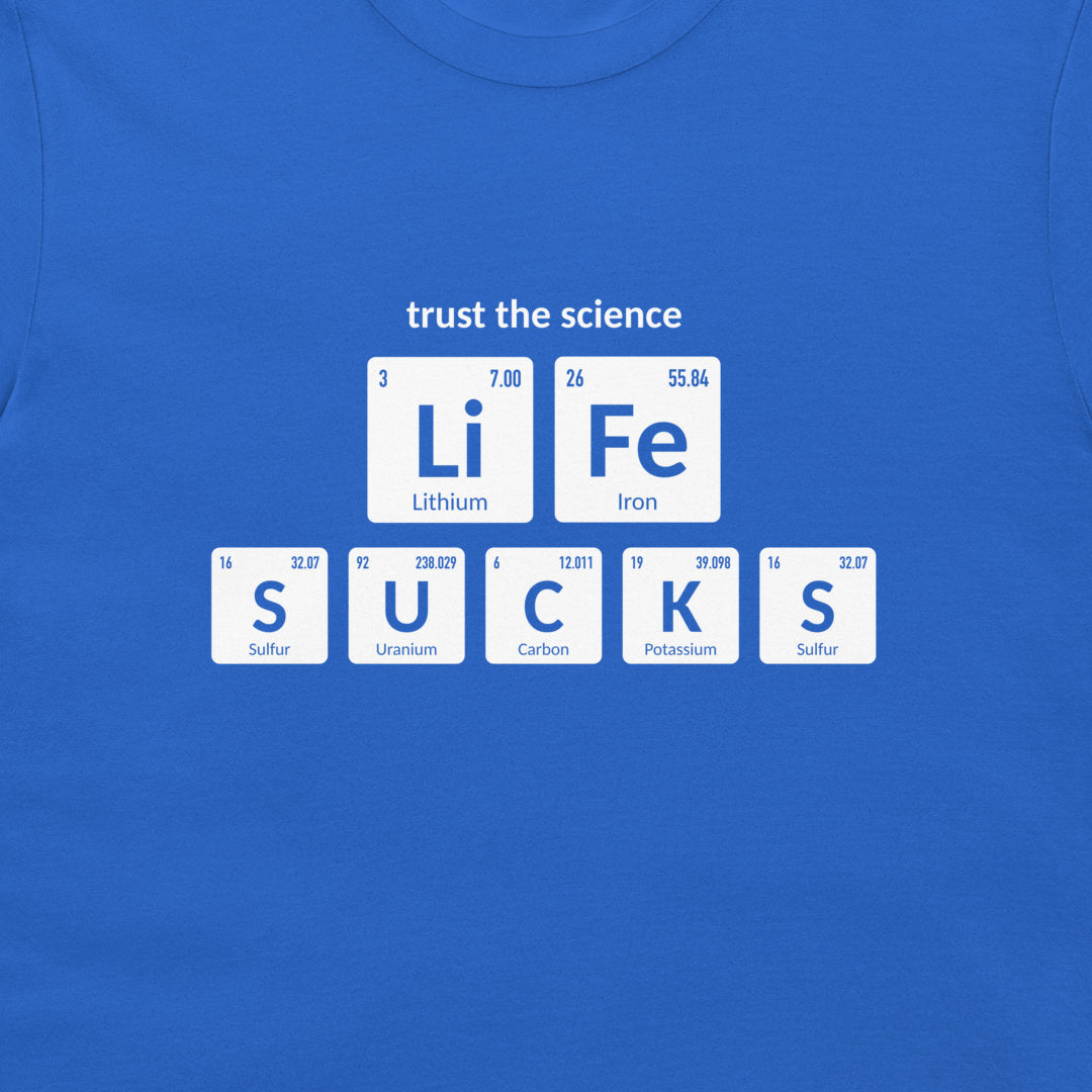 Close-up of Life Sucks periodic table element design on royal blue T-shirt