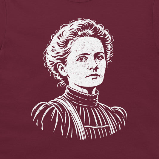 Close-up of the white Marie Curie portrait on a Maroon T-shirt.