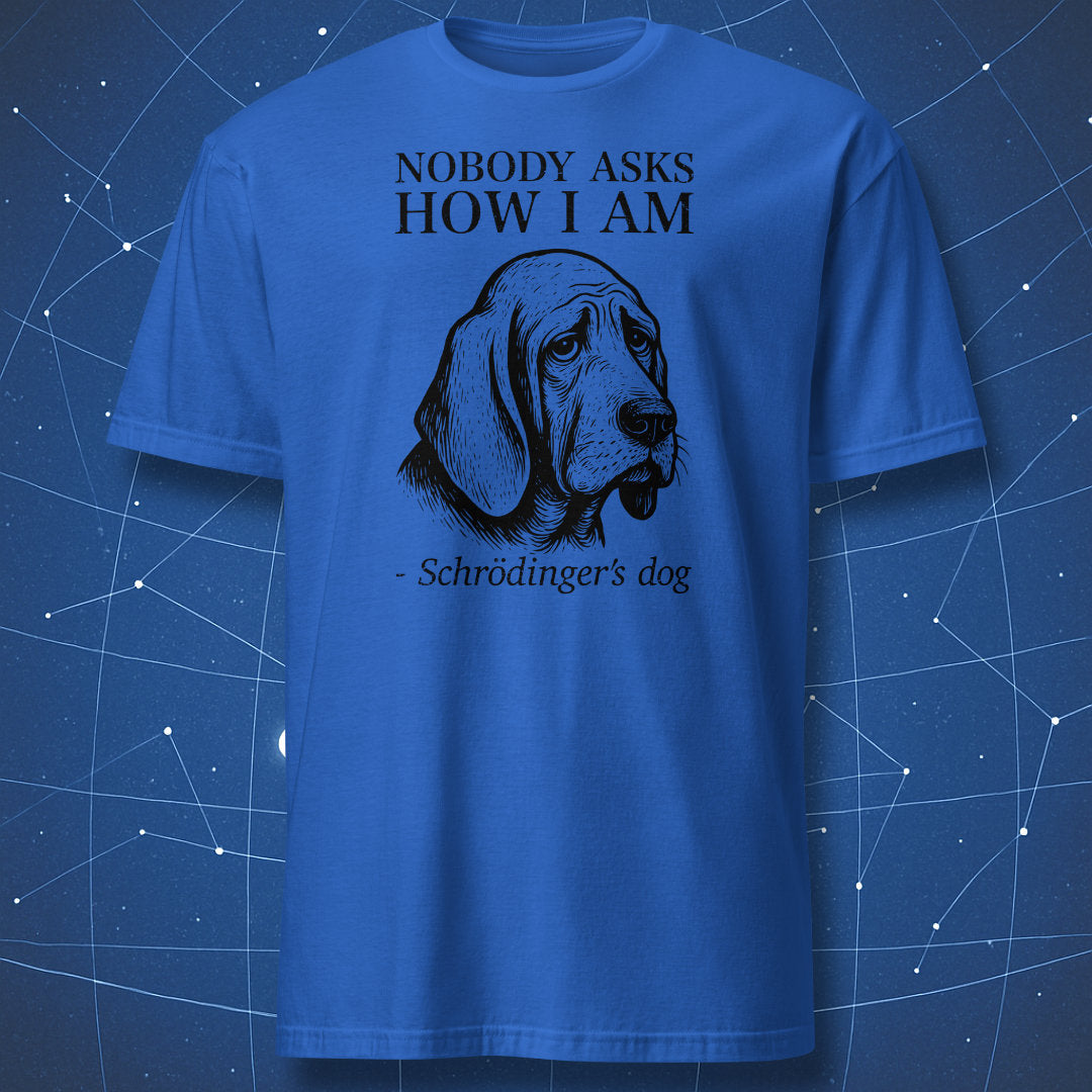 Royal blue T-shirt with a white line-art of a sad hound and quote “Nobody cares if I’m alive – Schrödinger’s dog” — clever science pun shirt.