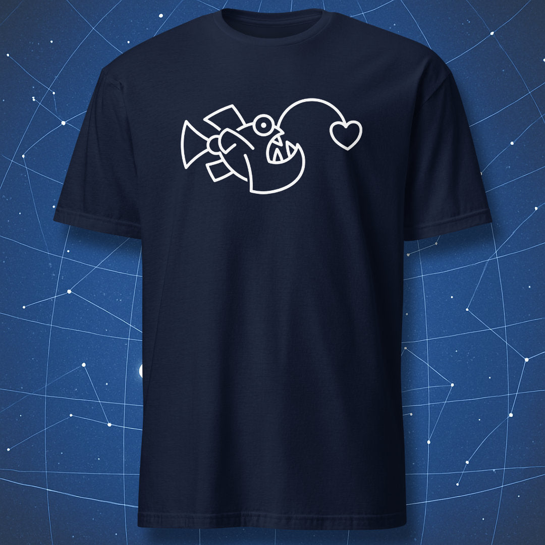 Anglerfish Heart T-shirt – simple ocean-themed line art with heart lure, printed on navy blue shirt.