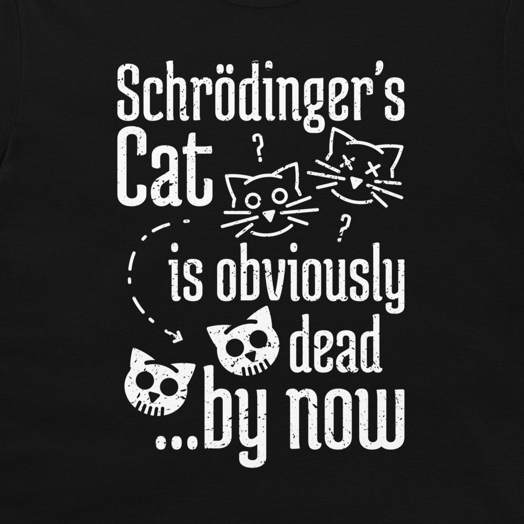 A close-up of a black t-shirt, featuring a white distressed graphic print of Schrödinger's cat with skull and question mark illustrations and the text 'Schrödinger's Cat is obviously dead .