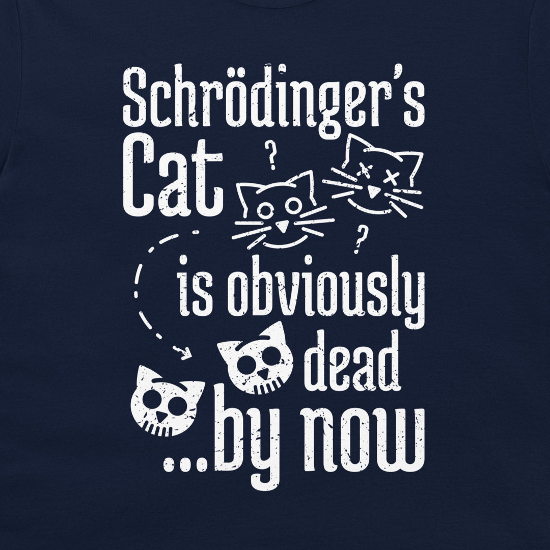 A close-up of a navy blue t-shirt featuring a white distressed graphic print of Schrödinger's cat in various states of life, including skull-faced versions and question marks.
