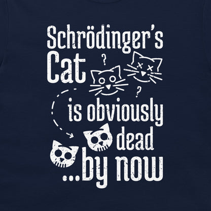 A close-up of a navy blue t-shirt featuring a white distressed graphic print of Schrödinger's cat in various states of life, including skull-faced versions and question marks.