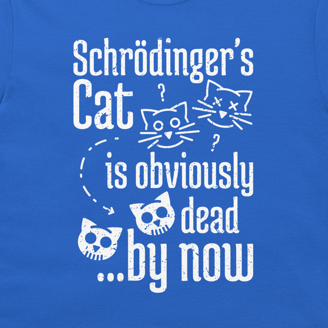 A close-up of a blue T-shirt with a distressed white graphic print that reads 'Schrödinger's Cat is obviously dead by now' with cartoon cat heads and question marks.