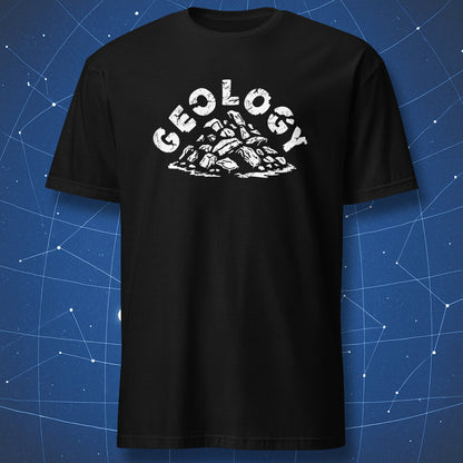 funny geology T-shirt on black background with white text “Geology” above a pile of rocks illustration