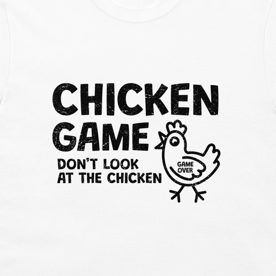 White t-shirt with a black distressed graphic print that reads 'CHICKEN GAME DON'T LOOK AT THE CHICKEN' alongside a cartoon chicken with 'GAME OVER' written on its chest.