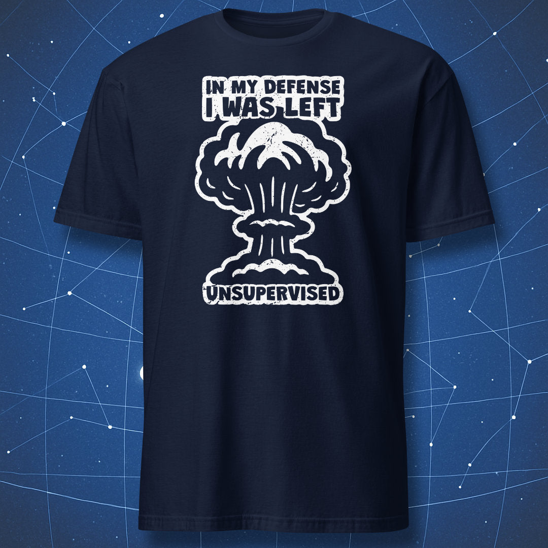 humorous nerd shirt on navy background featuring white explosion art and quote “In My Defense I Was Left Unsupervised”