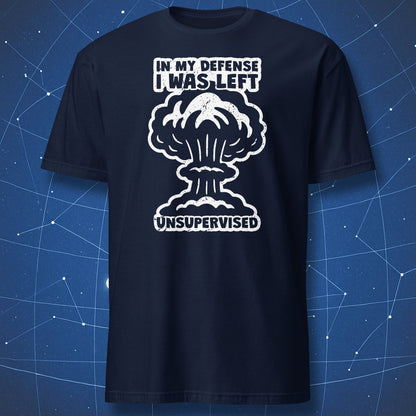 humorous nerd shirt on navy background featuring white explosion art and quote “In My Defense I Was Left Unsupervised”