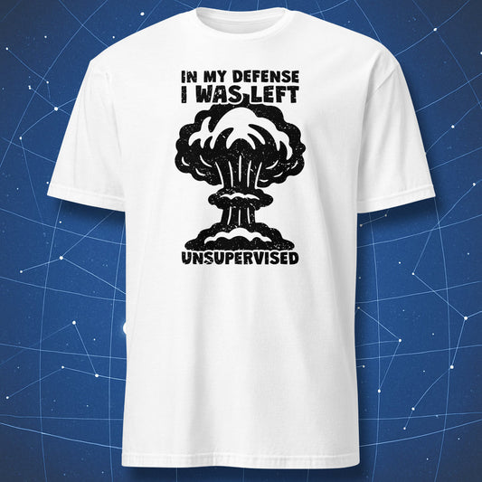 science humor T-shirt on white fabric featuring black mushroom cloud and text “In My Defense I Was Left Unsupervised”