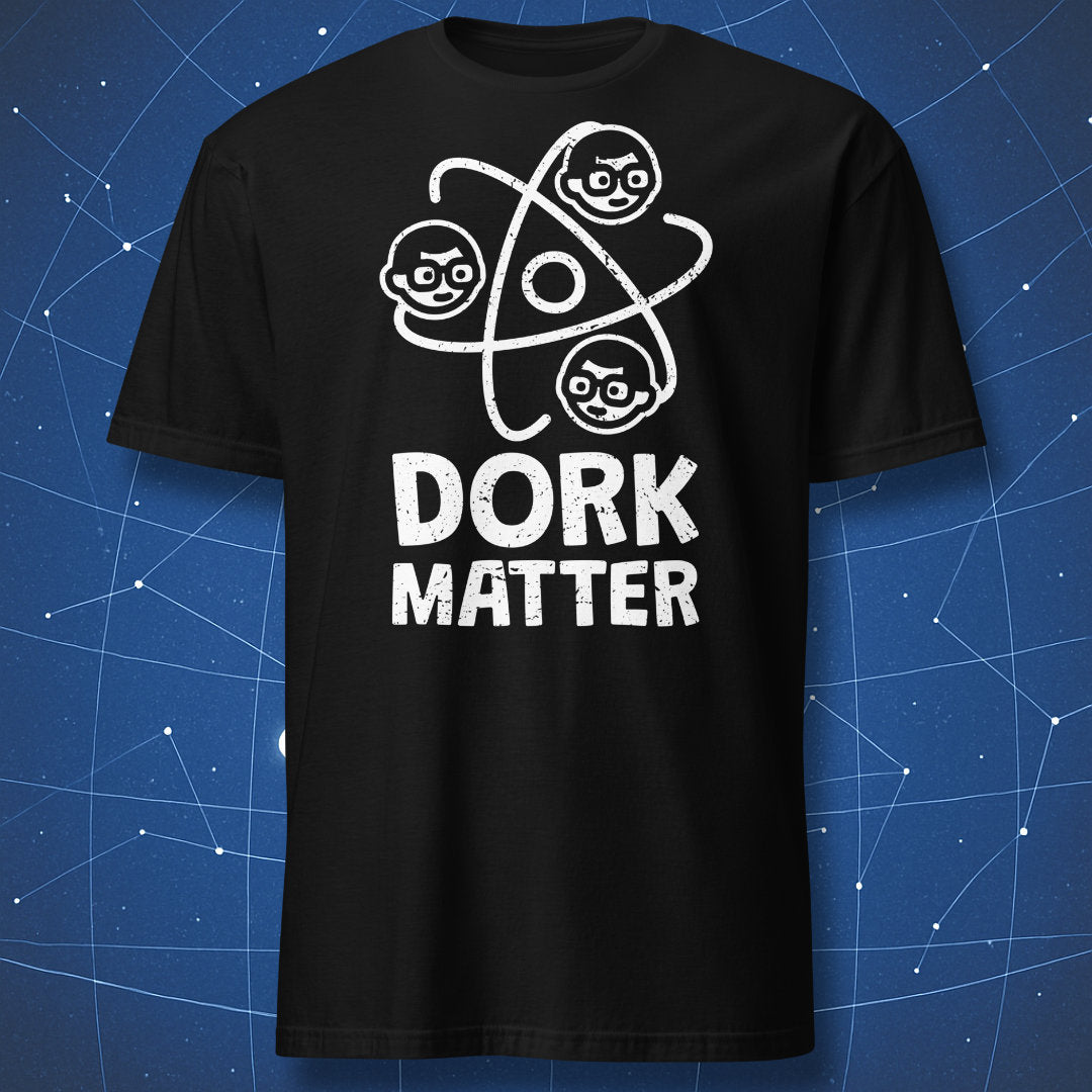 funny science T-shirt on black fabric with white atomic design featuring nerdy faces and text “Dork Matter”