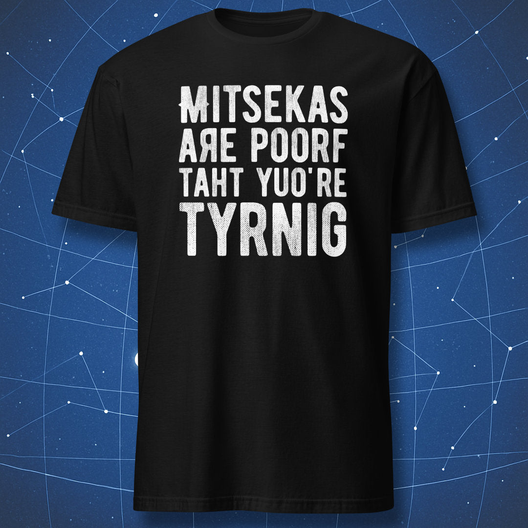funny typo motivation T-shirt on black fabric with white text “Mitsekas are poorf taht yuo’re tyrnig” in bold distressed letters