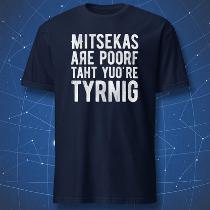 humorous motivational T-shirt on navy background with misspelled white quote celebrating effort and mistakes