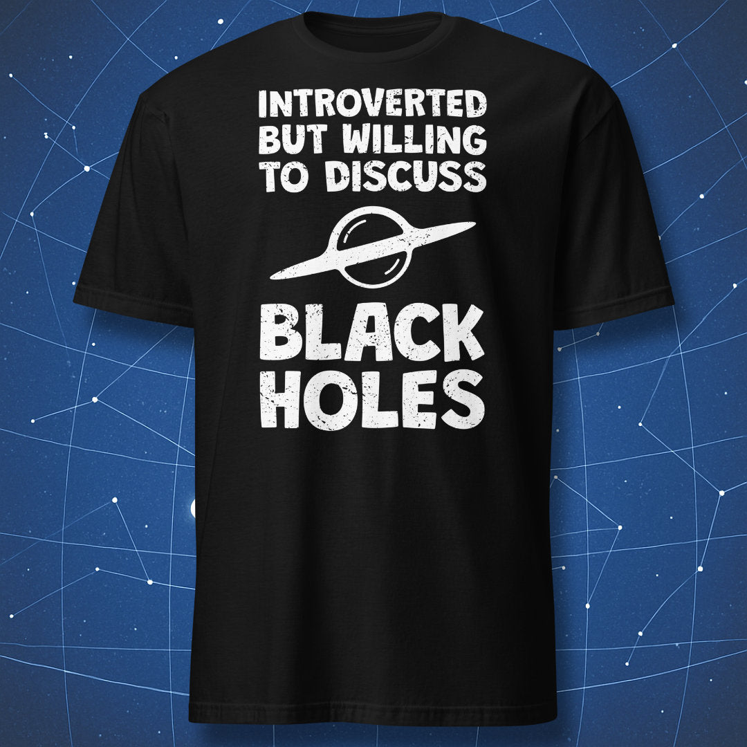 funny astronomy T-shirt on black fabric with white text “Introverted but willing to discuss black holes” and a stylized black hole graphic