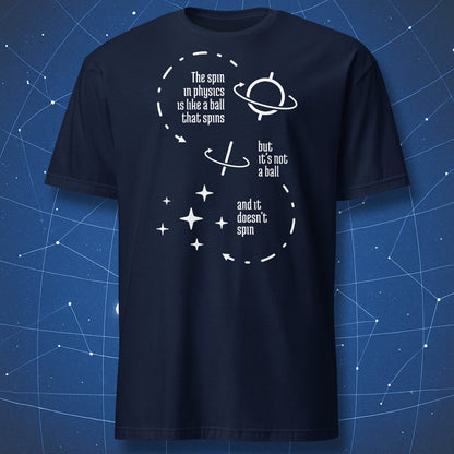 science humor T-shirt on navy fabric featuring white graphic of spinning ball and text about physics spin not actually spinning