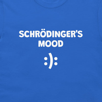 A close-up of a royal blue t-shirt featuring the white printed text 'SCHRÖDINGER'S MOOD' above a white smiley face symbol.