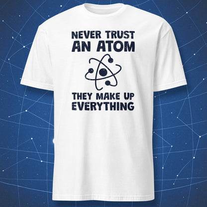 White t-shirt with atomic design and text on a blue geometric background