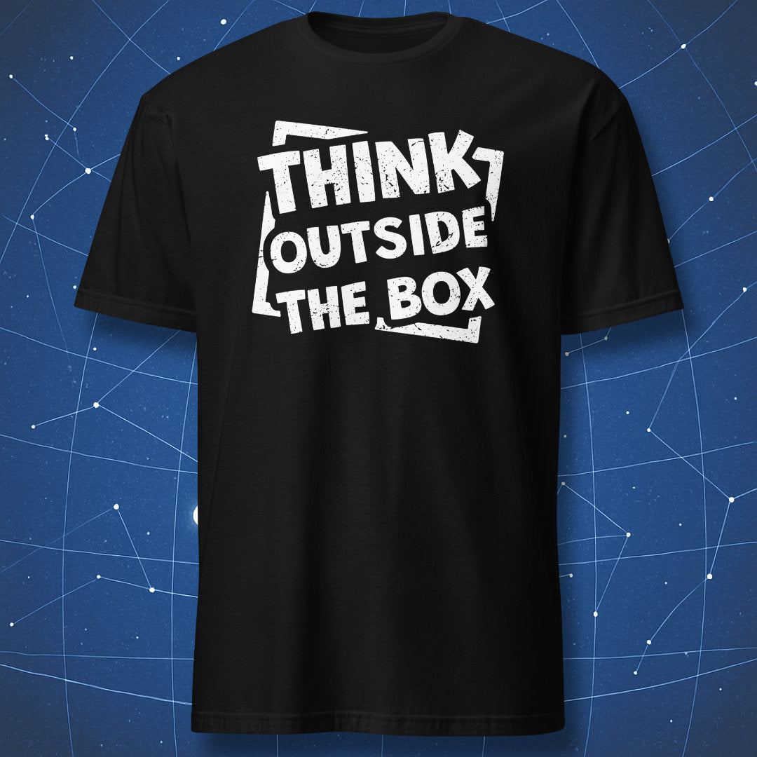 creative thinking T-shirt on black fabric with distressed white text reading Think Outside the Box in tilted layout breaking the frame