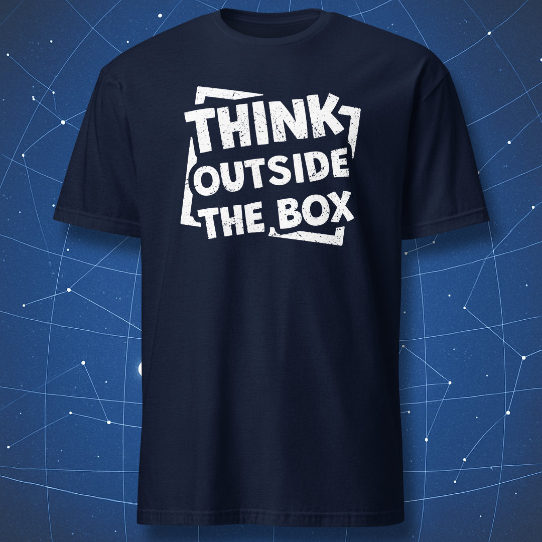 inspirational design T-shirt on navy fabric featuring bold white Think Outside the Box typography with broken box graphic