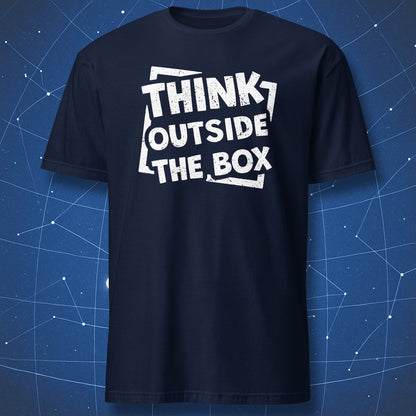 inspirational design T-shirt on navy fabric featuring bold white Think Outside the Box typography with broken box graphic