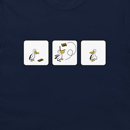A close-up of a navy blue t-shirt featuring a graphic print of three white square panels with a cartoon pelican and fake news.