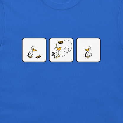 A close-up of a blue t-shirt featuring a graphic print of three white square panels with a cartoon pelican and fake news.