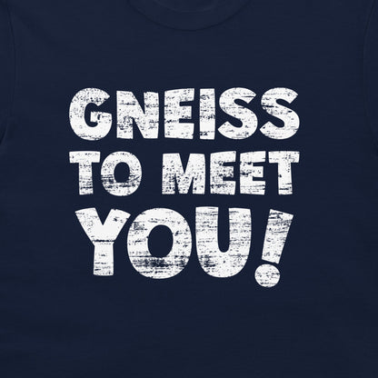 A close-up of a navy blue t-shirt featuring a distressed white graphic print that reads 'GNEISS TO MEET YOU!'.