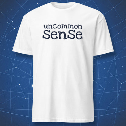 clever humor T-shirt on white background featuring the phrase uncommon sense in stylized yellow letters