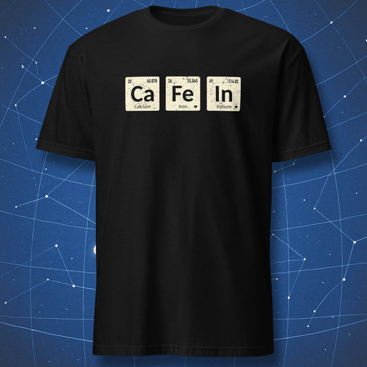funny chemistry T-shirt on black fabric showing periodic table elements Ca, Fe, and In spelling caffeine