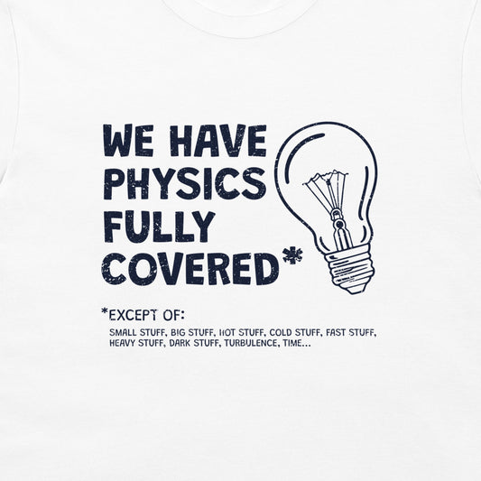 White t-shirt featuring a dark navy blue graphic print with the text 'WE HAVE PHYSICS FULLY COVERED' next to a lightbulb illustration and a humorous exception list.