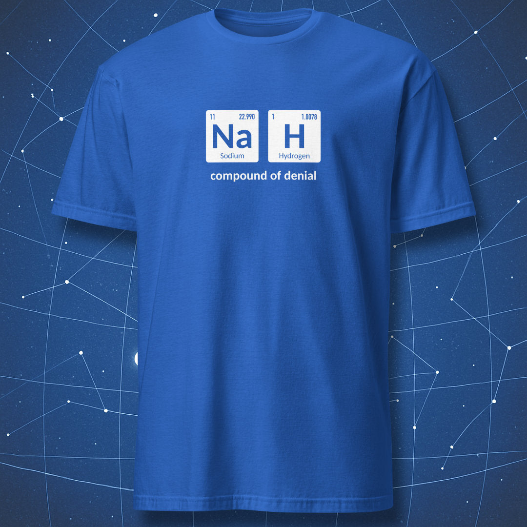 funny periodic table T-shirt on royal blue fabric showing Na and H chemical symbols and phrase “compound of denial”