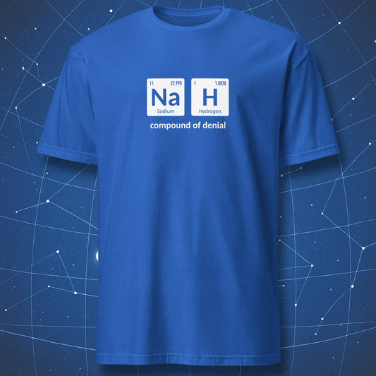 funny periodic table T-shirt on royal blue fabric showing Na and H chemical symbols and phrase “compound of denial”