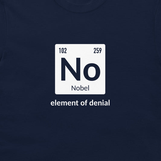 A black t-shirt featuring a white periodic table-style graphic with the word 'No' and 'Nobel' underneath, plus the phrase 'element of denial' printed below in white text.