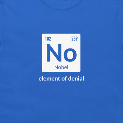 A close-up of a blue crewneck t-shirt featuring a white square graphic styled like a periodic table element with the letter 'No' and the name 'Nobel', with the phrase 'element of denial' printed below in white.