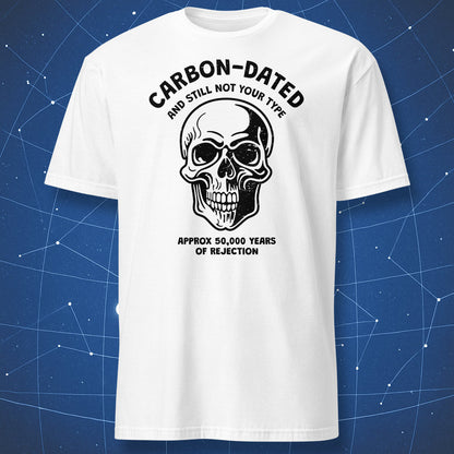 geek humor T-shirt on white fabric featuring black skull drawing and caption “Carbon-dated and still not your type”