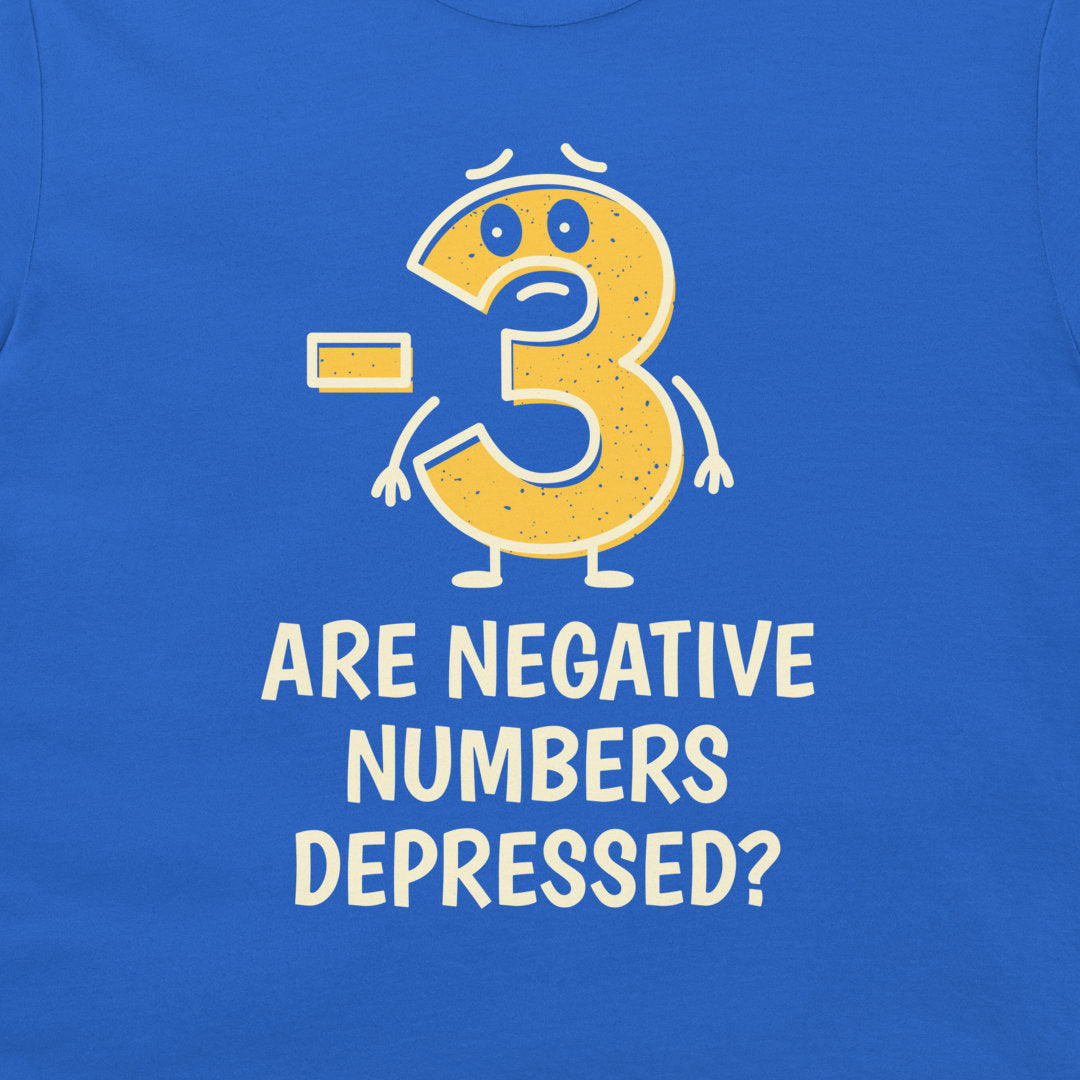 A close-up of a blue T-shirt featuring a graphic design of a distressed yellow number 3 with a sad face and a minus sign, above the text 'ARE NEGATIVE NUMBERS DEPRESSED?' in white.