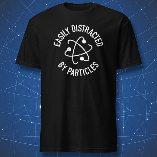 Black T-shirt with white atom illustration and text “Easily Distracted by Particles.”