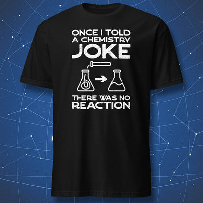 Black T-shirt with white text reading “Once I told a chemistry joke — there was no reaction” and simple chemistry flask graphics.