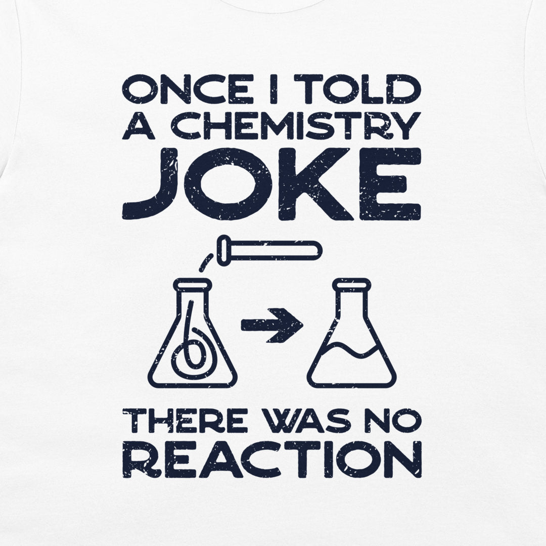 A white graphic print on a garment featuring the text 'ONCE I TOLD A CHEMISTRY JOKE THERE WAS NO REACTION' in distressed dark navy lettering, with simple beaker illustrations and an arrow in the center.