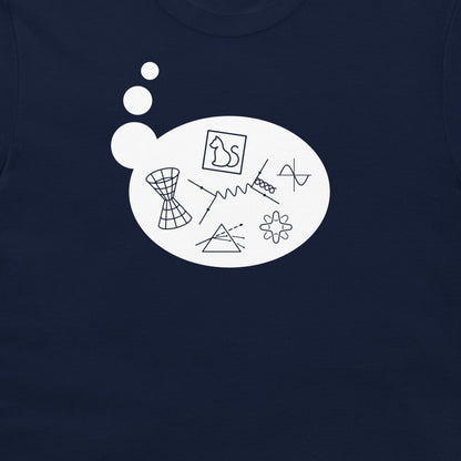 A close-up of a navy blue garment, likely a t-shirt, featuring a white graphic print on the chest. The graphic consists of a large white speech-bubble-like shape with abstract black line drawings, including a bow tie, a prism, a flower, and wavy lines, with three small white circles above it.