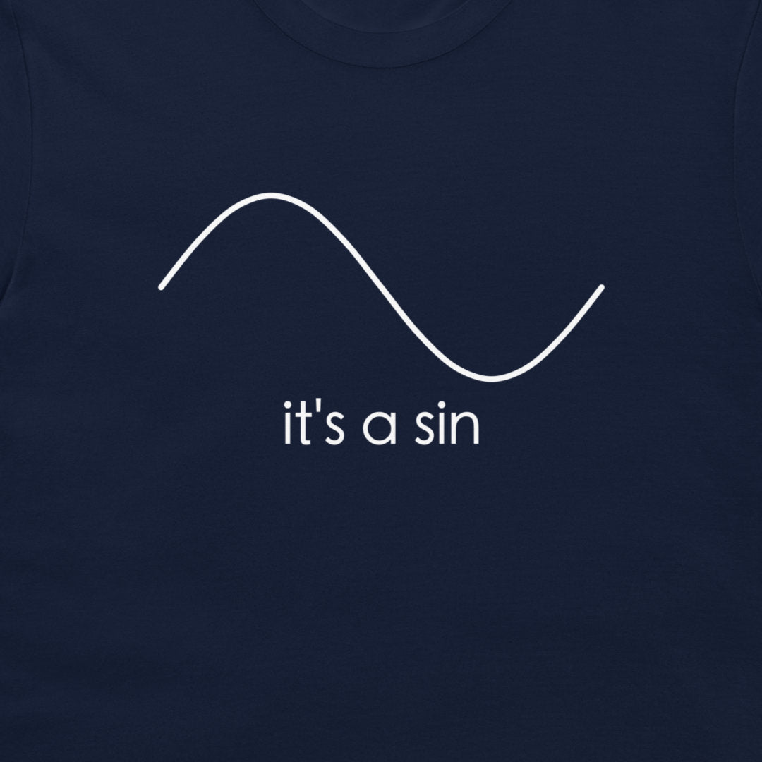 A close-up of a navy blue t-shirt featuring a white minimalist graphic of a sine wave and the text 'it's a sin' printed below it.